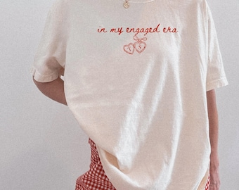 Future Mrs Engagement Shirt: Custom In My Engaged Era Coquette Locket Comfort Colors Personalized Bride To Be Shirt