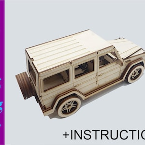 May include: A wooden model kit of a light brown SUV with a detailed interior and a spare tire on the back. The model is unassembled and comes with instructions.
