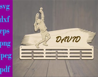 May include: A wooden tennis trophy featuring a silhouette of a tennis player holding a racket and a ball. The trophy has a nameplate that reads "DAVID" and a rack for medals or ribbons.