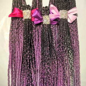 May include: A handmade, wooden serving tray with a natural finish. The tray features a rectangular shape with raised edges and integrated handles. The wood grain is visible, showcasing the tray's craftsmanship. Dimensions are approximately 16 inches long and 10 inches wide.