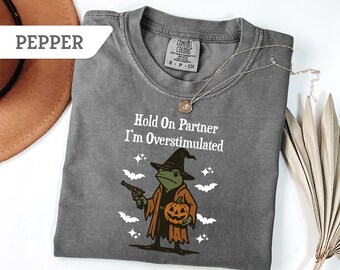 Comfort Colors®Hold on Partner I'm Overstimulated Tshirt, Funny Halloween TShirt, Halloween Shirt, Funny Spooky Season Frog Shirt Gift