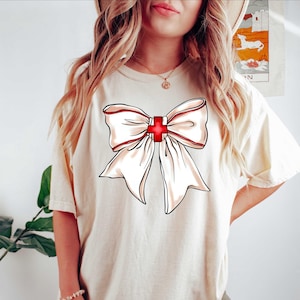 Nurse Bow Shirt, Gift for RN Shirt, Nursing Student Gift, Coquette Nurse Shirt, Nurse Bow Shirt,Stethoscope Nurse Shirt,Coquette Nurse Shirt