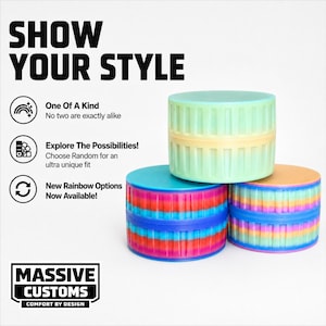 May include: Three colorful, cylindrical containers with a ribbed design. One is green and yellow, another is blue and red, and the third is orange and rainbow-colored. Text on the image reads "SHOW YOUR STYLE" and "MASSIVE CUSTOMS."