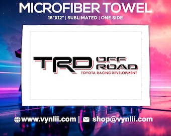May include: Microfiber towel, 18" x 12", with the TRD Off Road logo in black and red. The towel is sublimated on one side and features the Toyota Racing Development text. The website address www.vynlii.com is also displayed.