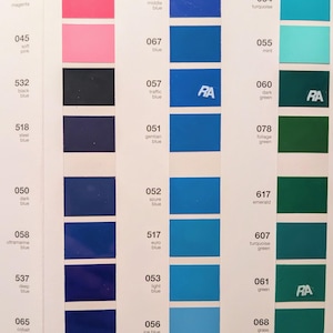 May include: Color chart featuring a variety of hues, including pinks, blues, and greens. Each color is displayed in a rectangular swatch with a corresponding number and name. The chart includes shades like magenta, turquoise, and emerald.