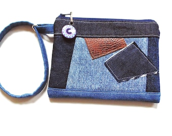 Upcycled denim patchwork wristlet purse with leather accents