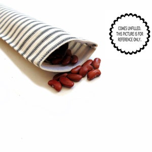 May include: A white fabric pouch with black stripes, partially open, spilling out red kidney beans. The pouch is empty and comes unfilled. This picture is for reference only.