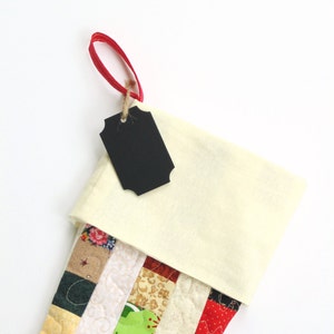 Stocking comes with a blackboard tag for writing name.