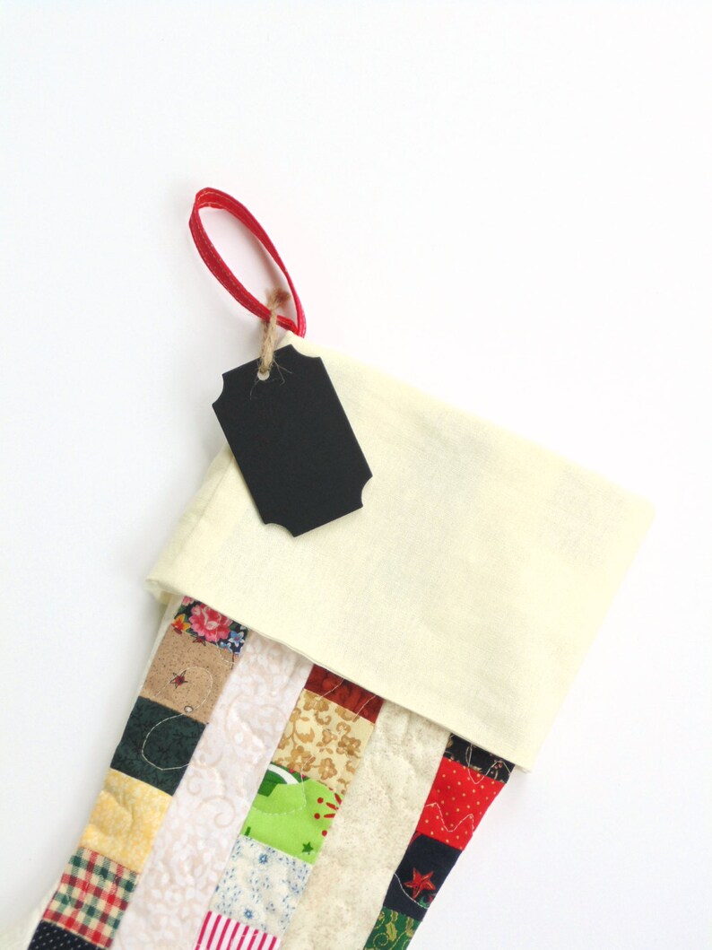Stocking comes with a blackboard tag for writing name.