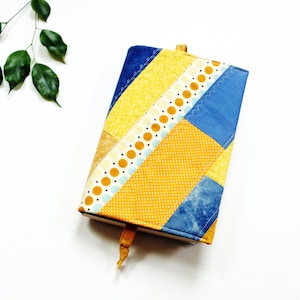 Quilted Book Sleeve, Patchwork Cotton Adjustable Cover with Bookmark