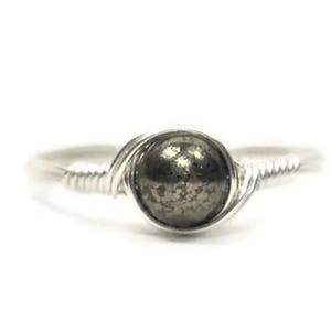 Anillo de plata fina envuelta en alambre de pirita .999