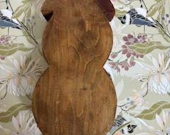 cuenco de madera con forma de muñeco de nieve