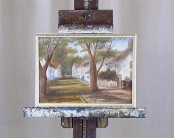 Oil Painting on Board, signed D. Flax depicting a Townscape or Village of Cottages, dated 1976