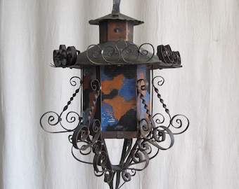 Rare 1920s California Spanish Colonial lantern in delicately wrought copper and reverse painted glass