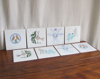 Art pottery bird tiles, set of eight with four pairs, c. 1950 antique vintage