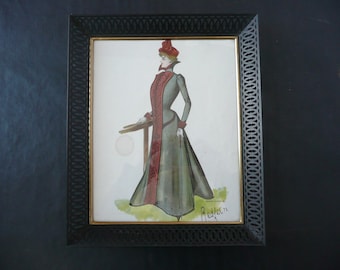 May include: A framed watercolor fashion illustration featuring a woman in a long, gray dress with a red accent. The artwork is in a black, ornate frame. The illustration is signed "Redfern".