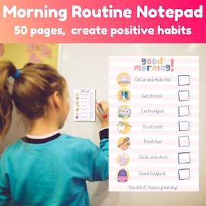 May include: A notepad with the text "Morning Routine Notepad" and "50 pages, create positive habits." The notepad has a checklist with illustrations for morning activities like getting dressed and brushing teeth. A child is holding a marker.