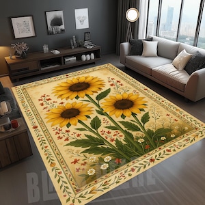 May include: A rectangular area rug featuring three large yellow sunflowers with brown centers and green leaves. The rug has a cream-colored background with a floral border of red and white flowers and green leaves. The rug is placed on a wooden floor.