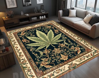 May include: A rectangular area rug with a dark blue background and a large, light green cannabis leaf in the center. The rug features floral and leaf patterns in shades of gold, green, and brown, with a cream-colored border.