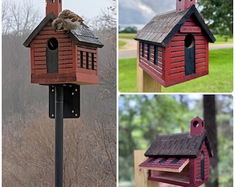 May include: A red wooden birdhouse shaped like a schoolhouse with a black shingled roof, a small cupola, and a circular entrance hole. The front features the text "Learn is Fun Principal" above the opening, and a side panel hinges open for access.