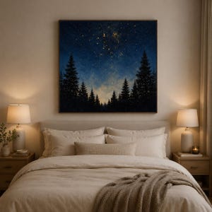 May include: A square wall art print featuring a dark blue night sky filled with golden stars above a silhouette of a dense pine forest. The painting displays a gradient from deep navy at the top to a lighter, hazy blue near the tree line.