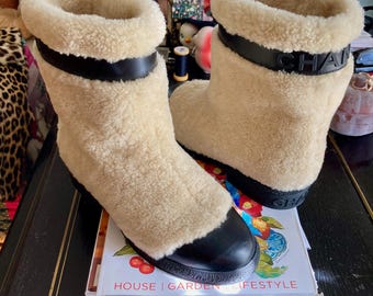 CHANEL Coco Neige shearling boots leather cap toe 38