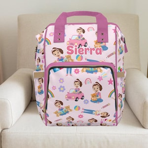 May include: Pink backpack with a repeating pattern of a girl, car, teddy bear, rainbow, and flowers. The name "Sierra" is printed in large pink letters on the front. The backpack has a top handle and adjustable straps.