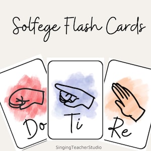 Peut inclure: Trois cartes flash rectangulaires intitulées Solfege Flash Cards en haut. Chaque carte présente un dessin au trait noir d'un signe de la main sur une tache d'aquarelle et une syllabe musicale : Do en rouge, Ti en violet et Re en orange.