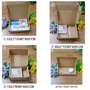 May include: Four open cardboard boxes of varying sizes, each containing stationery items. The boxes are surrounded by floral arrangements. Box 1 measures 22cm x 15cm x 4cm and contains a notebook and pen. Boxes 2, 3, and 4 also contain stationery.
