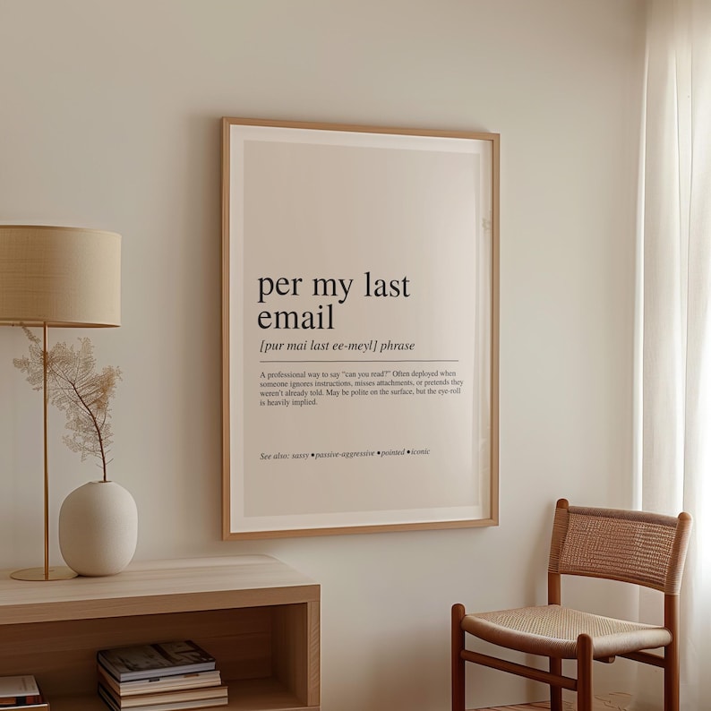 a framed definition of an email, which is a professional way to say "I want to communicate with you". The definition states that a professional email should be used to ask questions, provide updates, or express feelings, and it should be polite and considerate. The email should be sent and received in a timely manner, and it should be easily understood by the recipient.