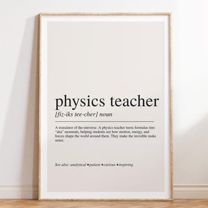 May include: A framed wall art print featuring a dictionary-style definition of the term physics teacher. The text is printed in black on a light beige background, including the phonetic pronunciation, noun classification, and a descriptive paragraph.