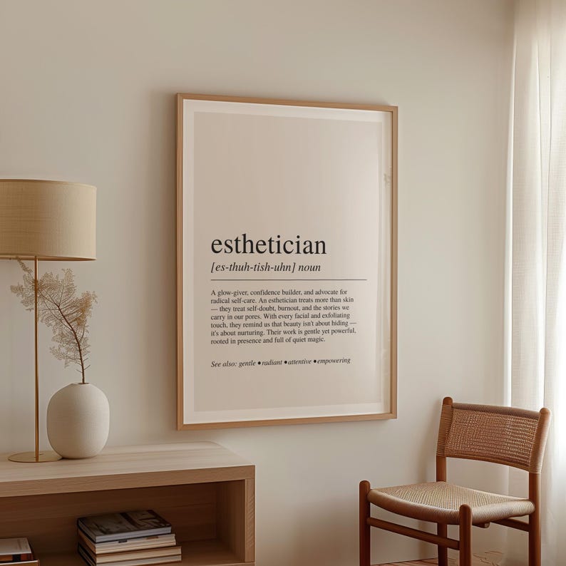 a picture hanging on a wall next to a chair