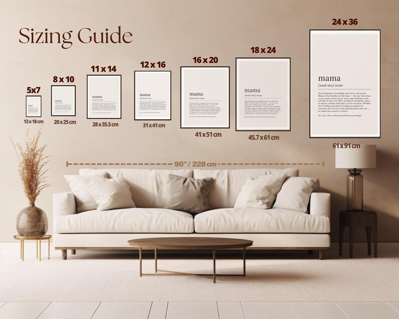 The image displays a living room with a large white sofa, a coffee table, and a lamp. Above the sofa, there is a wall with a guide for choosing and arranging picture frames, providing sizes and dimensions for each frame.