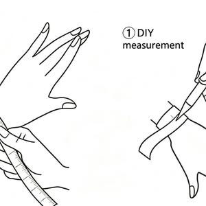 May include: A black and white line drawing illustration showing two methods for measuring a wrist. The left side shows a soft ruler measurement, and the right side shows a DIY measurement using a strip of paper and a pencil to mark the length.