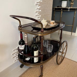 bar cart vintage trolley Hollywood regency drinks gold 50s Italian handmade wheels pannelli vetro scomponibili mid century hotel guest gift
