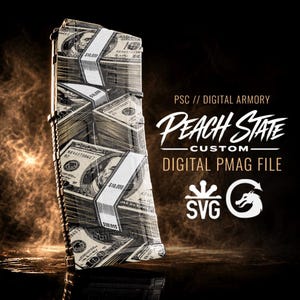 May include: A rifle magazine featuring a black and white graphic print of stacked one hundred dollar bills. The text reads PSC // DIGITAL ARMORY PEACH STATE CUSTOM DIGITAL PMAG FILE, accompanied by an SVG icon and a dragon logo on the right side.