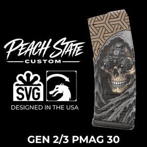 May include: A black and tan magazine with a skull graphic wearing night vision goggles. The magazine has a geometric pattern at the top and the text "Peach State Custom" and "Designed in the USA". The text "GEN 2/3 PMAG 30" is also visible.