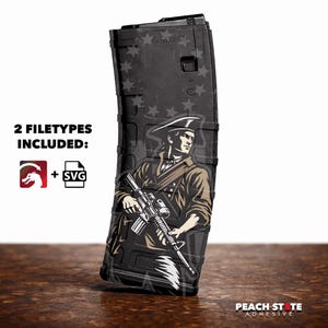 May include: Black magazine with a patriotic design featuring a colonial soldier holding a rifle. The magazine has a star pattern and the text "6.5 Grendel". The image includes the text "2 Filetypes Included:" with a dragon logo and an SVG icon.