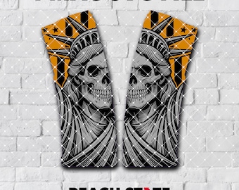May include: Two graphic designs featuring a skull with the Statue of Liberty's crown, set against a yellow and black striped background. The text "PMAG SVG FILE" is at the top, and "PEACH STATE ADHESIVE" is at the bottom.