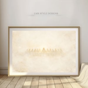 May include: A framed horizontal wall art print featuring a monochromatic, ethereal depiction of The Last Supper in soft beige and cream tones. The text LMR STYLE DESIGNS is printed in small, dark grey capital letters above the framed artwork.