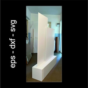 May include: A white, geometric sculpture with a rectangular base and vertical panels of varying heights. The sculpture is set against a backdrop of a room with a tiled floor. Text on the left side reads "eps - dxf - svg".