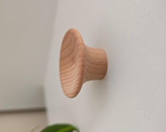 Concave beukenhouten muurhaak: minimalistische Scandinavische hanger