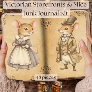 May include: A vintage-style book with a brown cover and gold accents. The book features illustrations of two mice dressed in Victorian clothing. The text on the cover reads "Victorian Storefronts & Mice Junk Journal Kit" and "48 pieces".