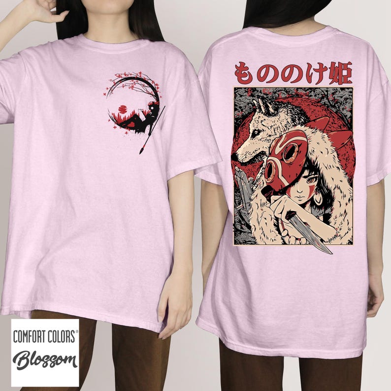 May include: Light pink t-shirts with graphic designs. One shirt features a circular design with a figure reading under a tree. The other shirt displays a character with a wolf and text in Japanese.