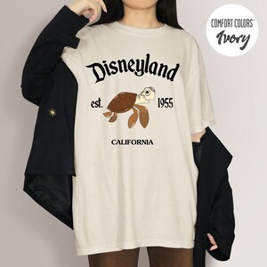 Chemise couleurs confort Retro Squirt Est 1955, chemise Tous les personnages Le Monde de nemo, chemise Le Monde de Dory Pixar, plongée avec tuba Squirts