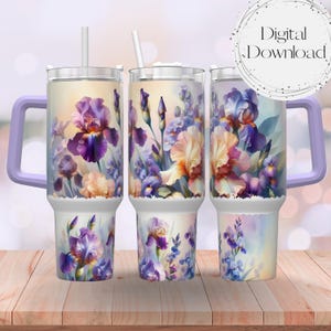 May include: Three stainless steel tumblers with a purple and white floral design. The tumblers have a clear lid and a purple handle. The design features a watercolor style painting of iris flowers.