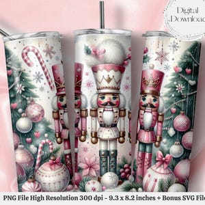 May include: A set of three skinny tumblers with a festive Christmas design. The design features nutcrackers, Christmas trees, ornaments, and candy canes in shades of pink, white, and green. The tumblers are 9.3 x 8.2 inches.
