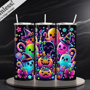 May include: Three Halloween-themed tumblers with a seamless design. The tumblers feature colorful cartoon ghosts, pumpkins, and candy. The design includes stars, bows, and witch hats in neon colors against a black background. Each tumbler has a white straw.