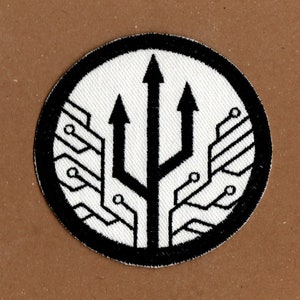 May include: Black and white embroidered patch featuring a trident design within a circle. The trident has three points and is encircled by a circuit board pattern.