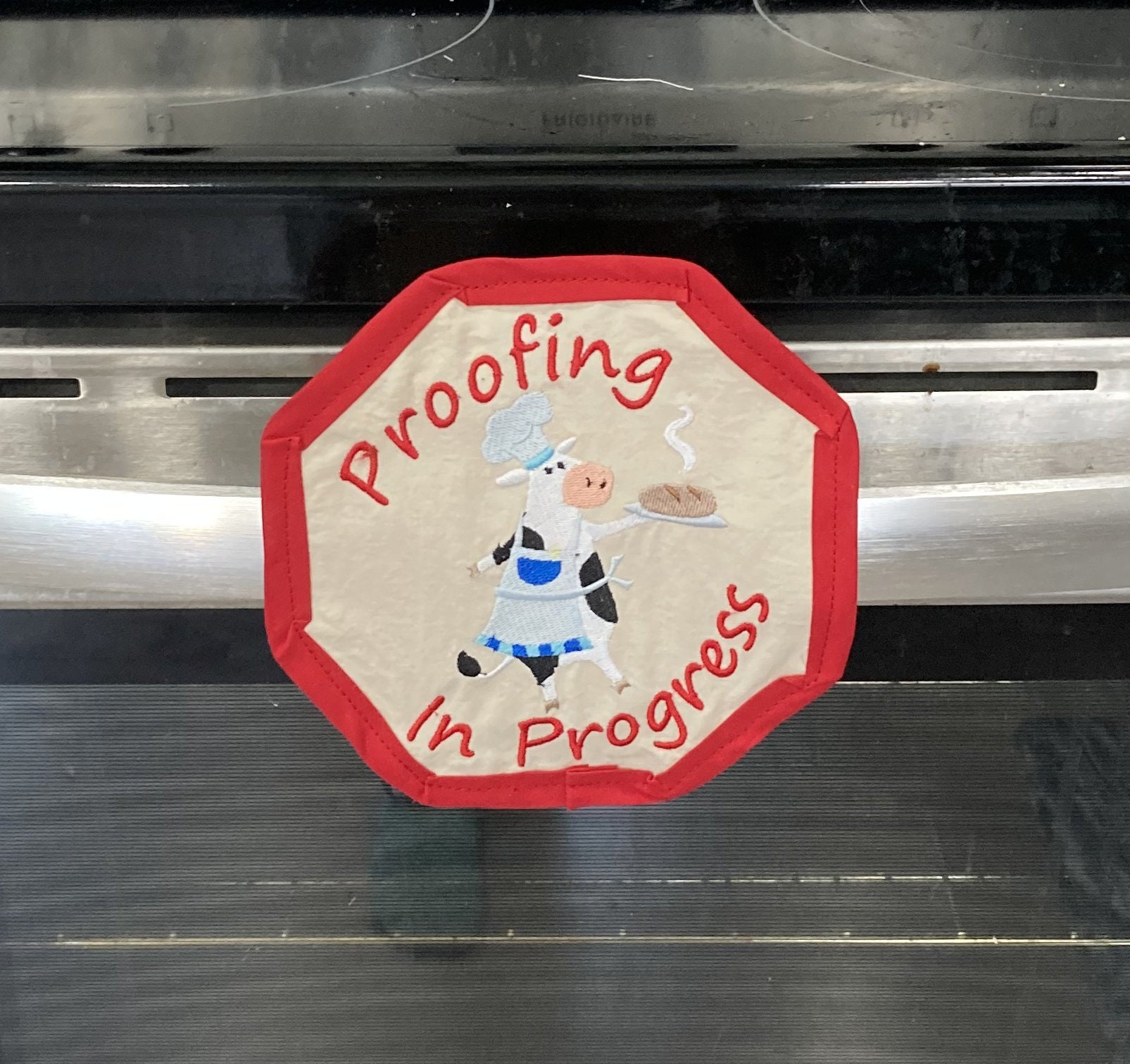 Señal de advertencia del horno de prueba en curso